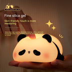 Panda silicone lamp held in hand with text about fine silica gel and skin-friendly touch